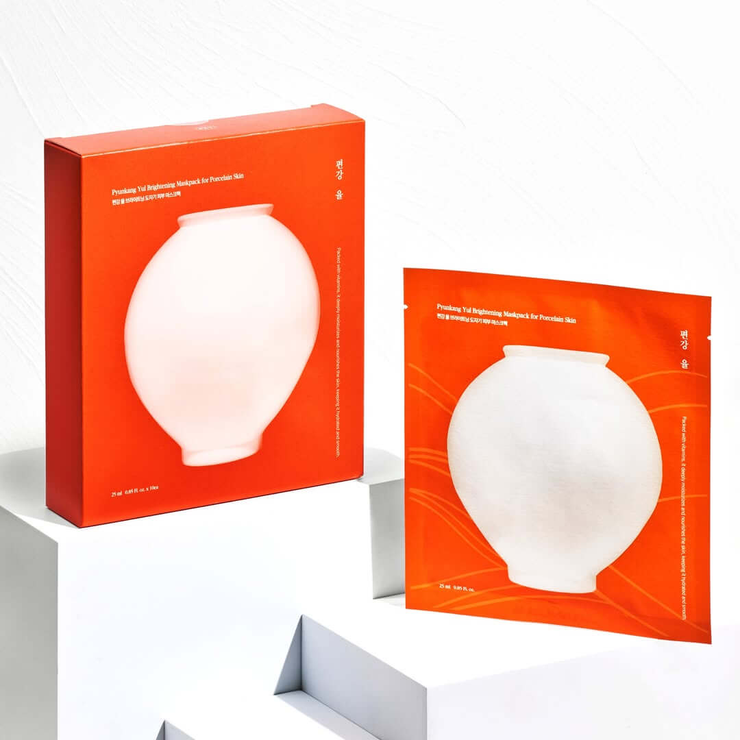 PYUNKANG YUL Brightening Porcelain Skin Mask Pack 10 pieces box and mask display on white background.