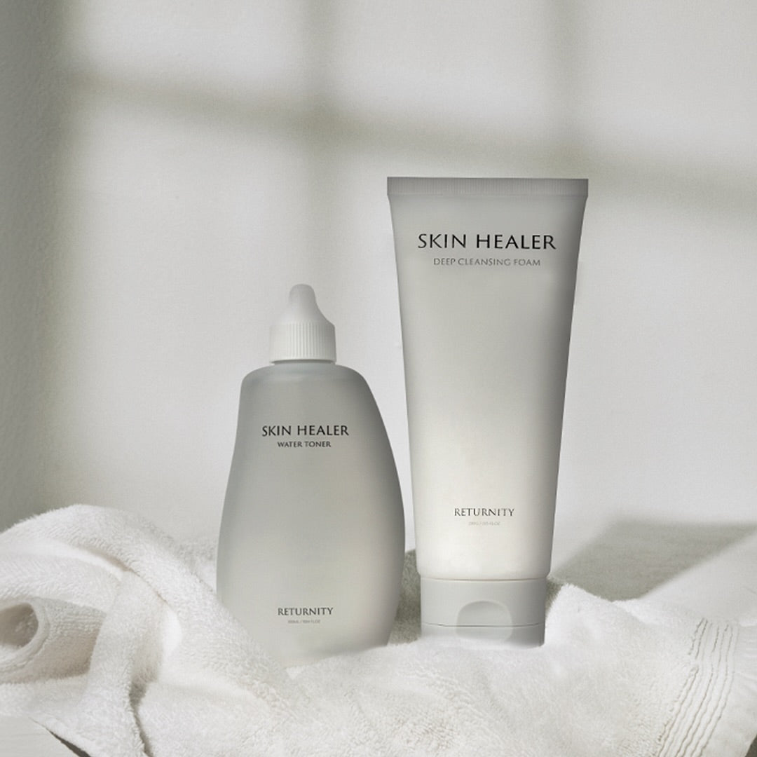 RETURNITY Skin Healer Water Toner 300ml and Deep Cleansing Foam on a white towel