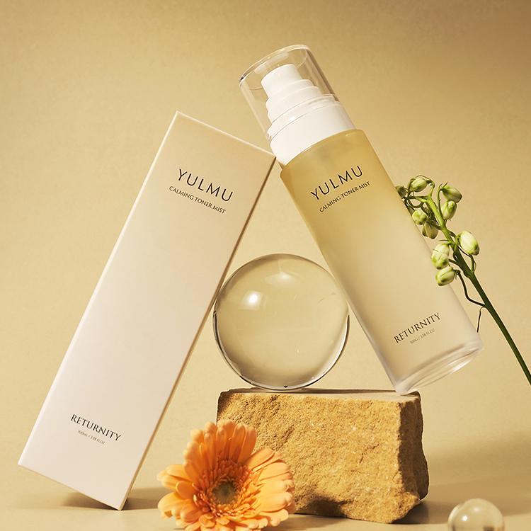 RETURNITY Yulmu Calming Toner Mist 100ml with packaging on display, featuring elegant design and soothing ingredients.