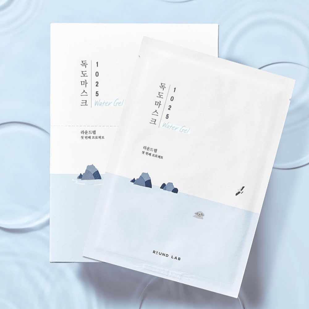 Packaging of ROUND LAB 1025 Dokdo Hydrating Water Gel Mask on a textured blue background