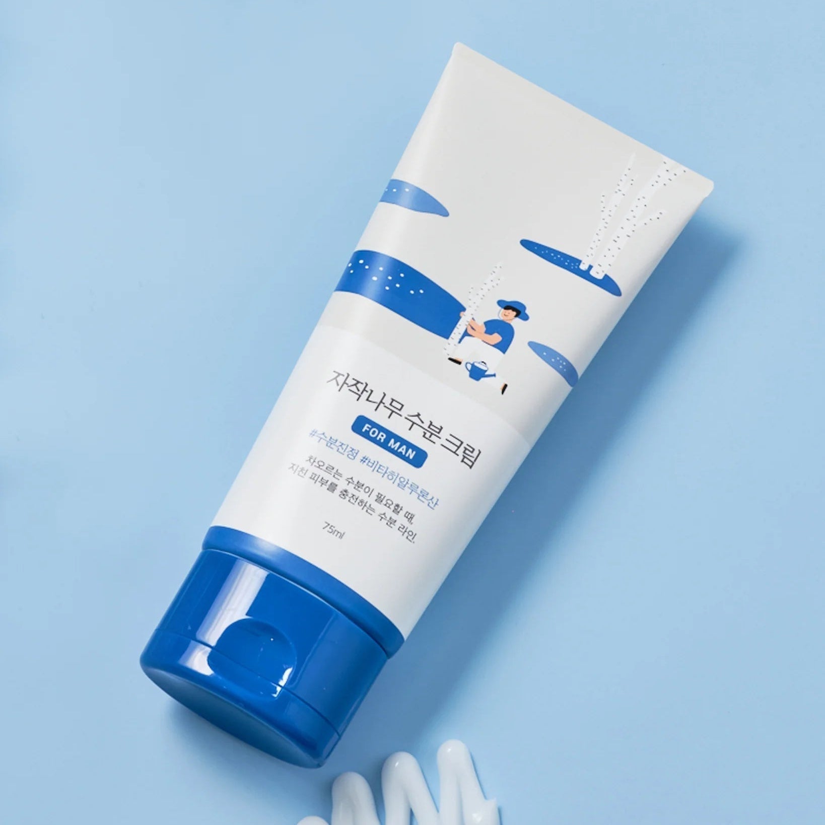 ROUND LAB For Men Birch Moisture Cream 75ml - Gentleman Korea product shot of blue-white tube and cream on light blue background