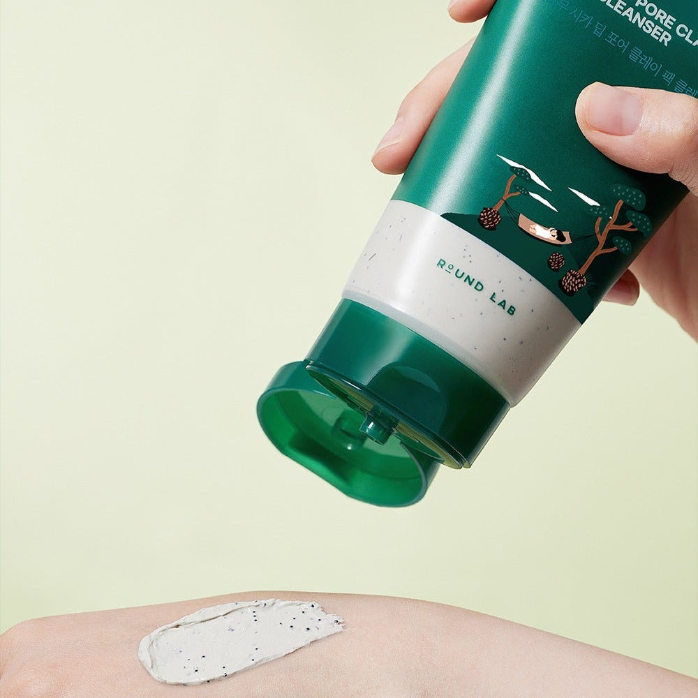 ROUND LAB Pine Cica Deep Pore Clay Pack Cleanser 150ml being applied on skin