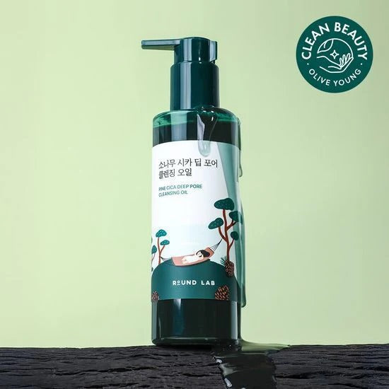 ROUND LAB Pine Cica Deep Pore Cleansing Oil 200ml bottle on green background, showcasing clean beauty design and packaging.
