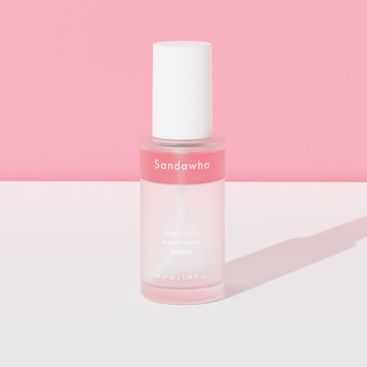 SANDAWHA Double Effect Anti Wrinkle Serum 50ml in a stylish bottle against a pink and white background