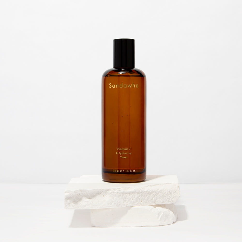 SANDAWHA Vitamin C Whitening Toner 150ml bottle on white backdrop, designed for skin brightening and hydration.