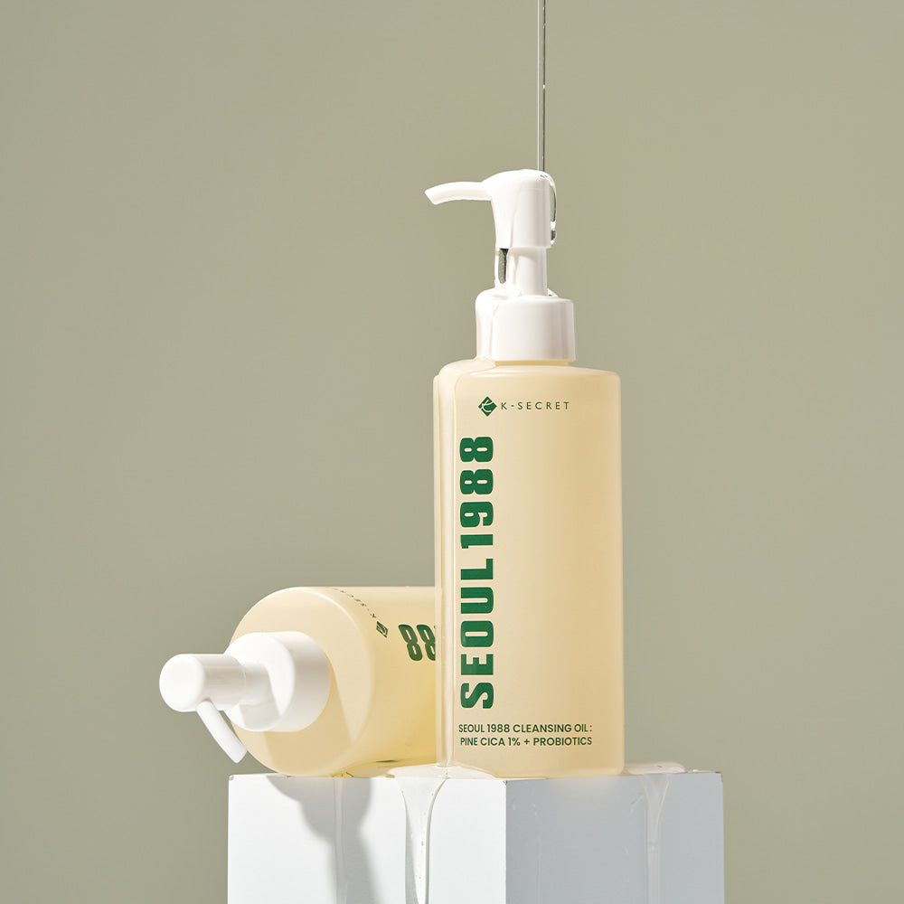 SEOUL 1988 Pine Cica Cleansing Oil bottle displayed on a pedestal, showcasing skincare product.