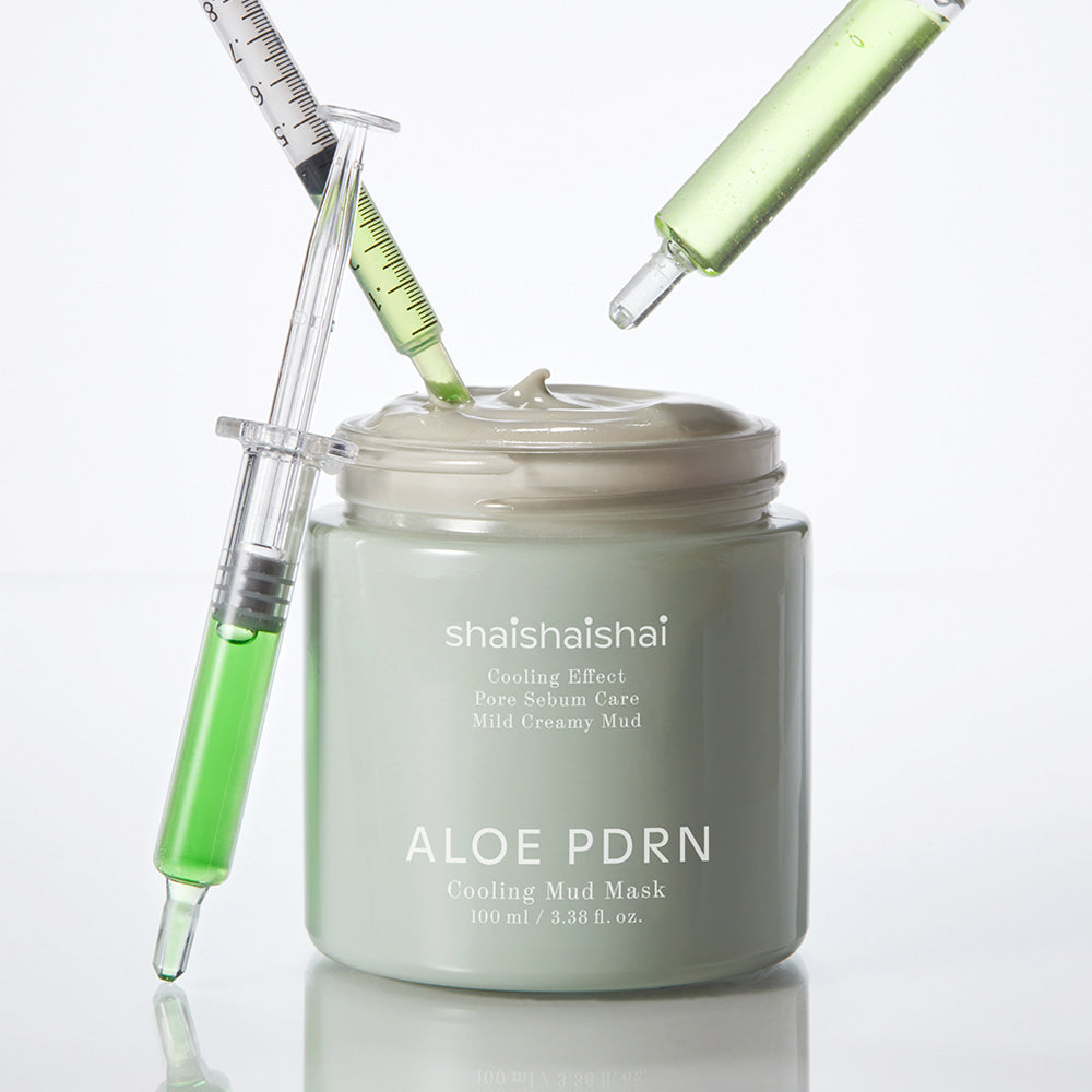 SHAISHAISHAI [1+1]Aloe PDRN Cooling Mud Mask 100ml jar with syringes of green liquid, highlighting cooling and moisturizing effects.