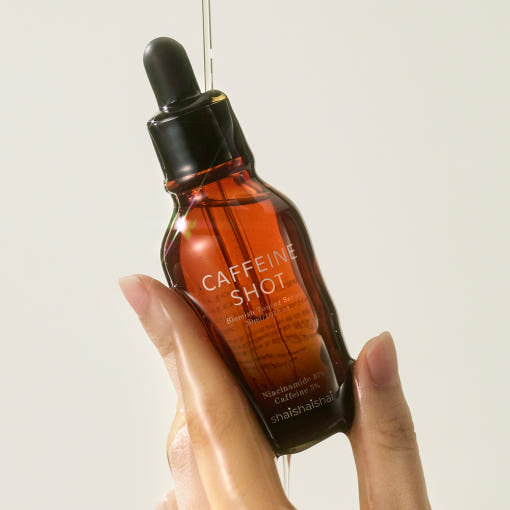 SHAISHAISHAI Caffeine Shot Blemish Toning Serum 30ml in hand with dropper close-up
