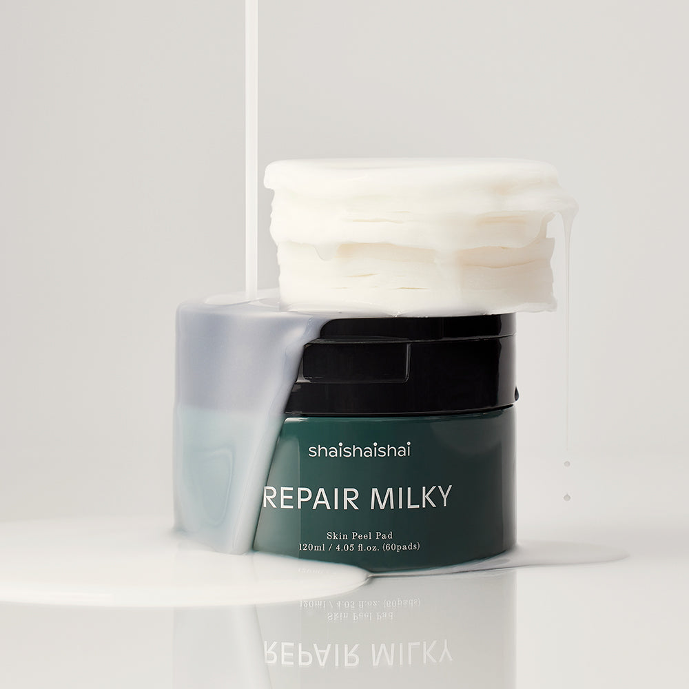 SHAISHAISHAI Repair Milky Skin Peel Pad 60 Pads 120ml in a decorative image with creamy texture.