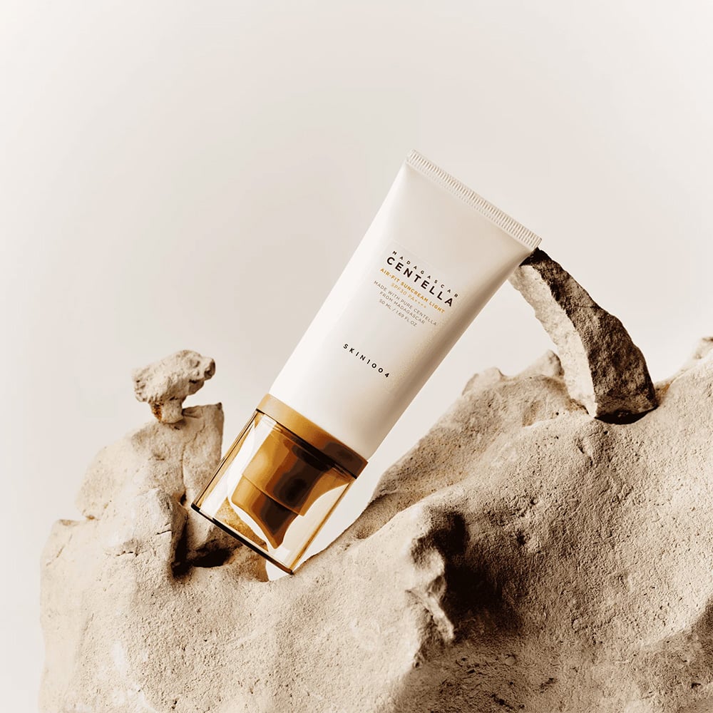 SKIN1004 Madagascar Centella Air-fit Sunscreen Light 50ml on natural rock background