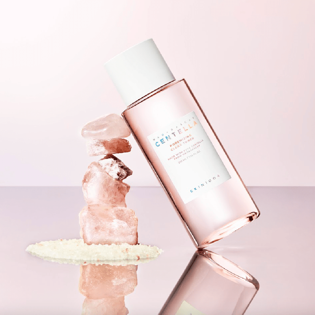 SKIN1004 Madagascar Centella Poremizing Clear Toner 210ml bottle with natural elements on pastel background