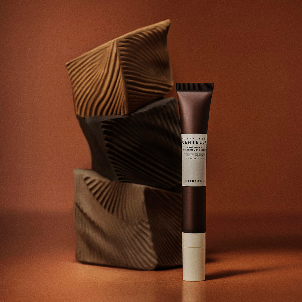 SKIN1004 Madagascar Centella Probio-cica Bakuchiol Eye Cream 20ml against artistic background