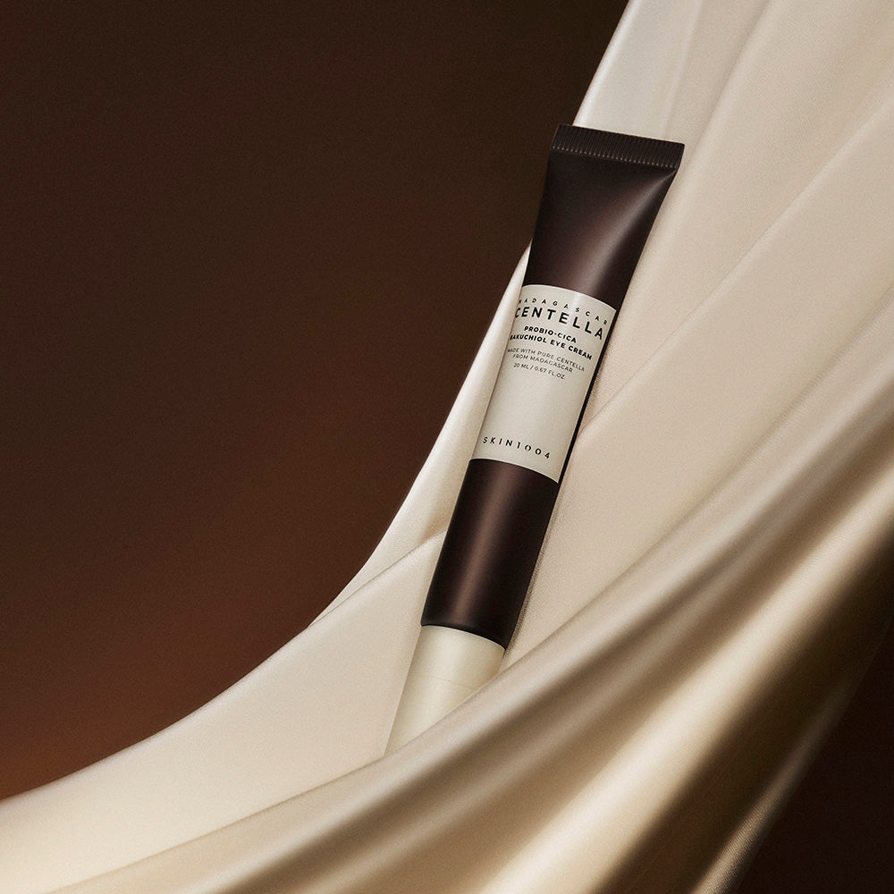 SKIN1004 Madagascar Centella Probio-cica Bakuchiol Eye Cream 20ml tube on a smooth surface