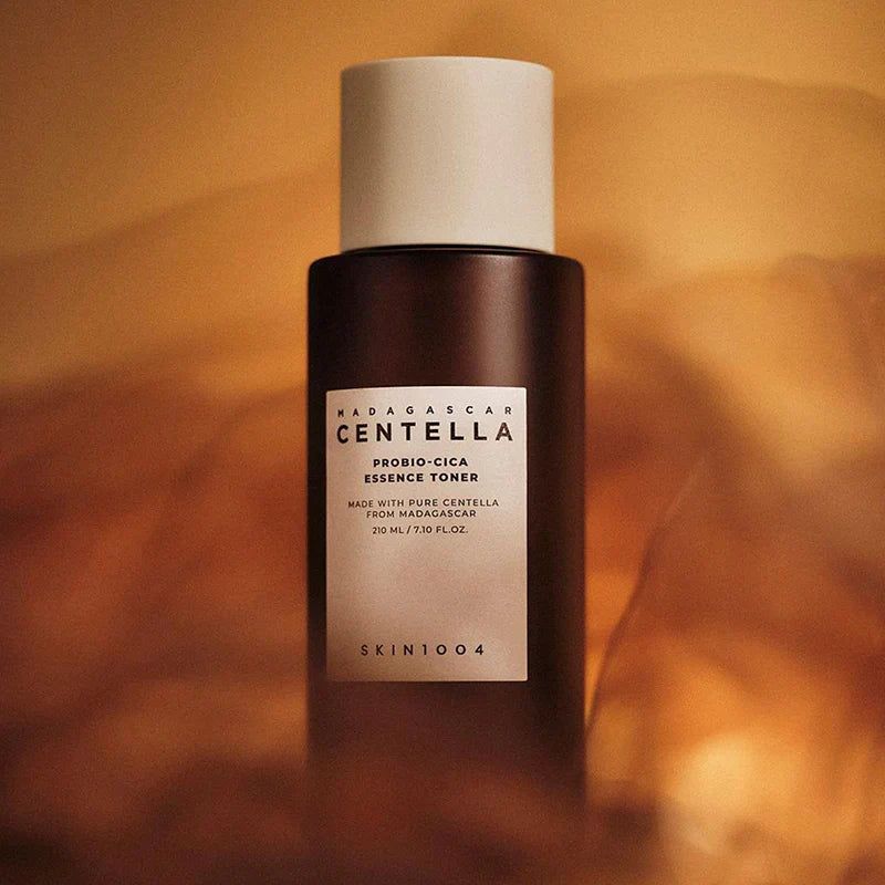 SKIN1004 Madagascar Centella Probio-cica Essence Toner 210ml bottle with rich background