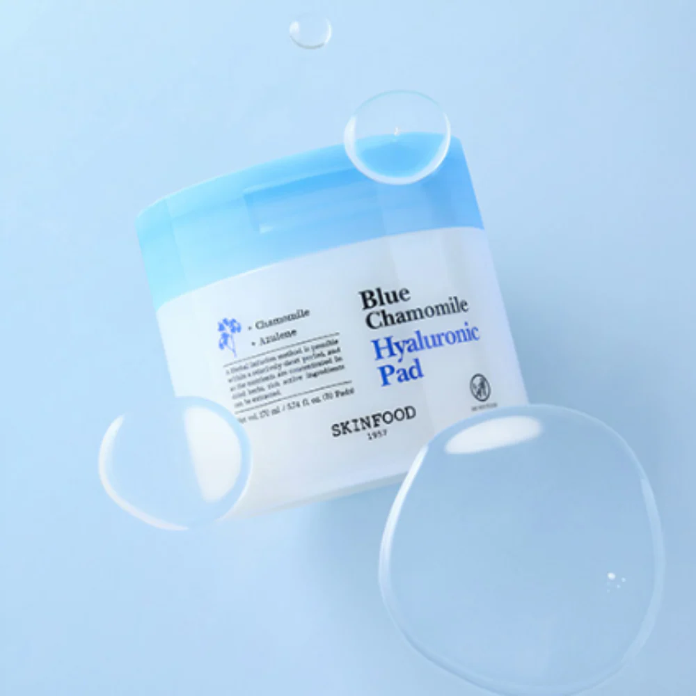 SKINFOOD Blue Chamomile Hyaluronic Gel Pads 70 Sheets on blue background with bubbles