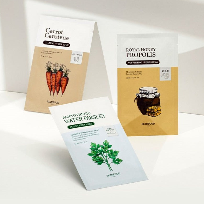 Collection of SKINFOOD face masks including Calming, Nourishing, Clear Mask, Carrot Carotene, Royal Honey Propolis, and Water Parsley.
