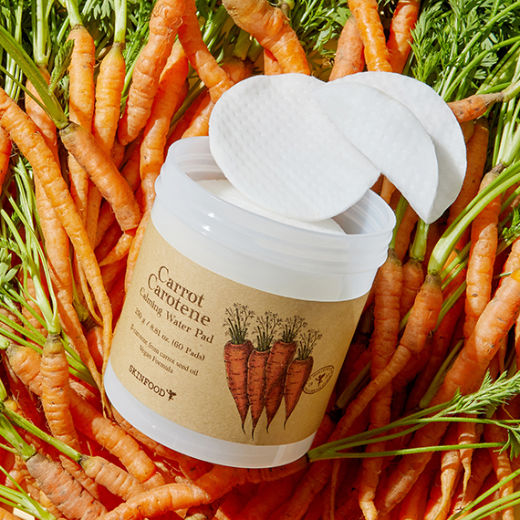 SKINFOOD Carrot Carotene Calming Water Pad 250g displayed with fresh carrots