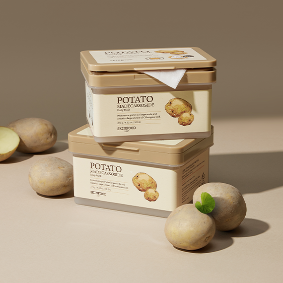 SKINFOOD Potato Madecassoside Daily Mask 30p 270g - two containers with potatoes on a beige background