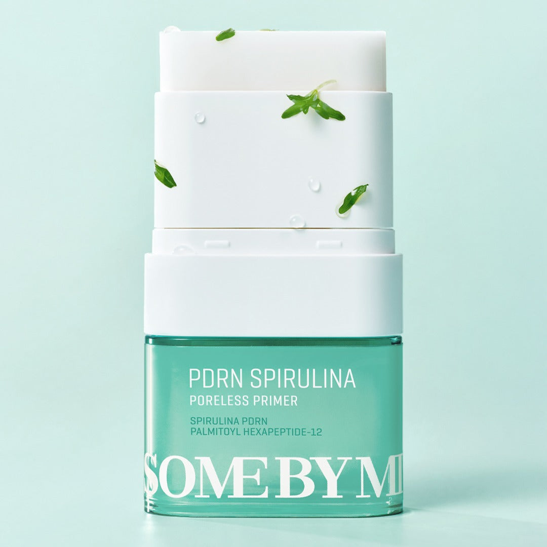SOME BY MI PDRN Spirulina Poreless Primer 10g in a stack with green spirulina details on a pastel background.