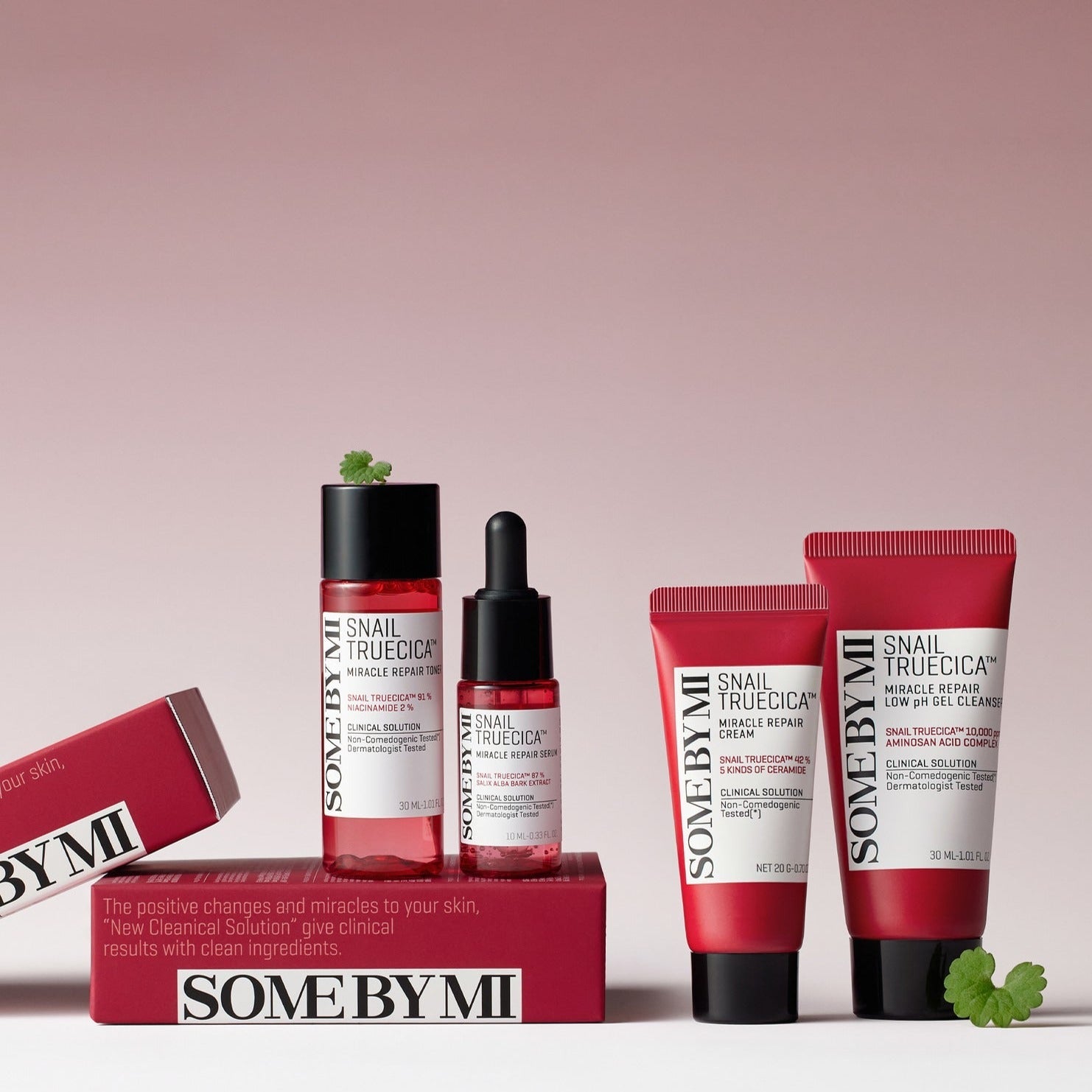 SOME BY MI Snail True Cica Miracle Repair Starter Kit (Cleanser+Toner+Serum+Cream) displayed on a pink background.