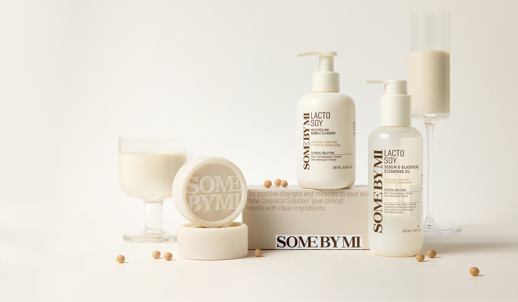 Some By Mi Lacto Soy Skincare Products with Clean Ingredients Displayed with Soy Milk and Beans