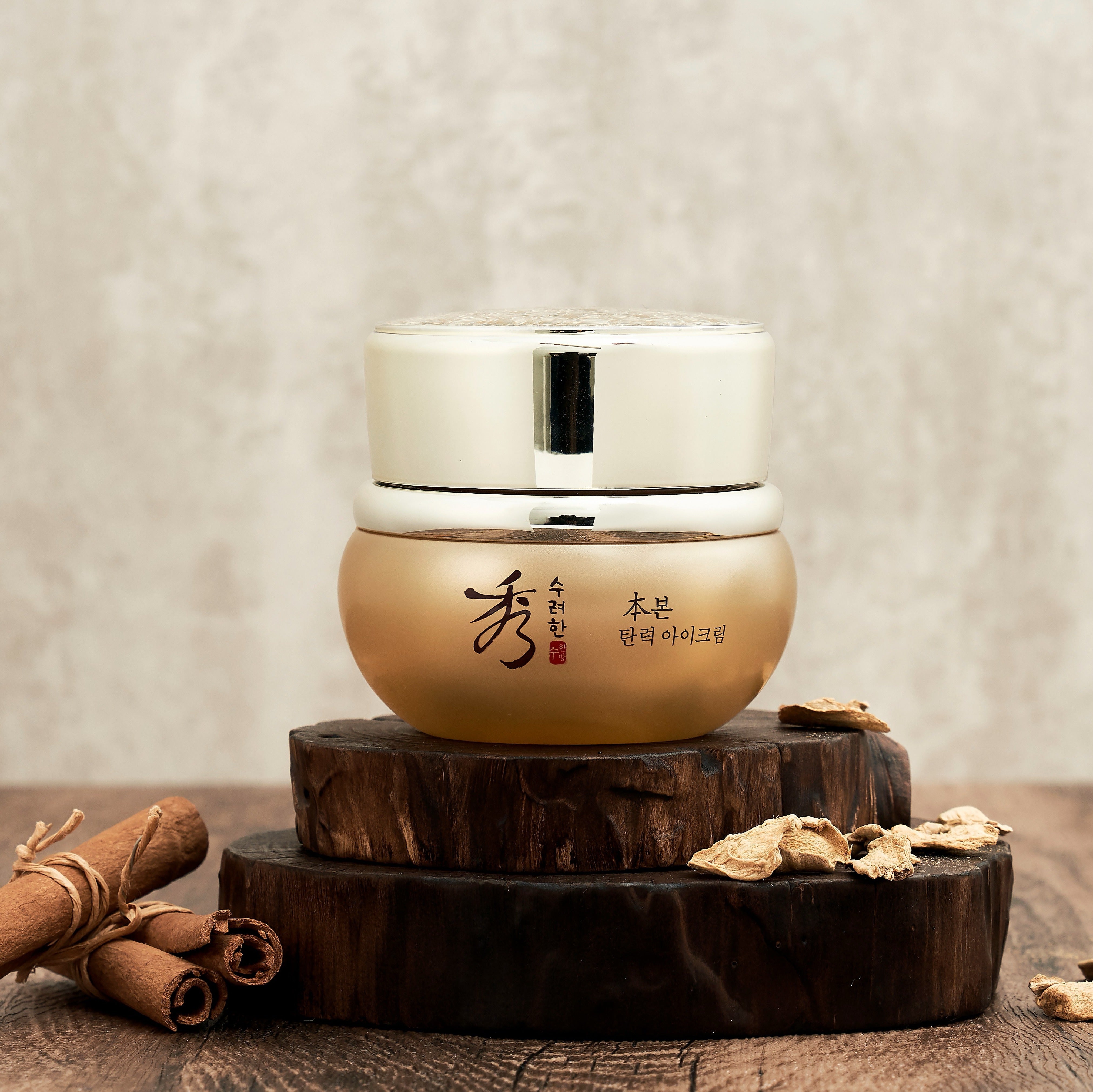 SOORYEHAN Bon Elasticity Eye Cream 25ml in elegant jar displayed on wooden platform with natural decor