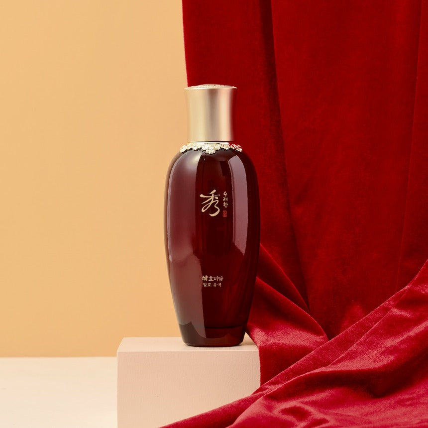 SOORYEHAN Hyobidam Fermented Milk 150ml bottle displayed on a pedestal with a red fabric background.