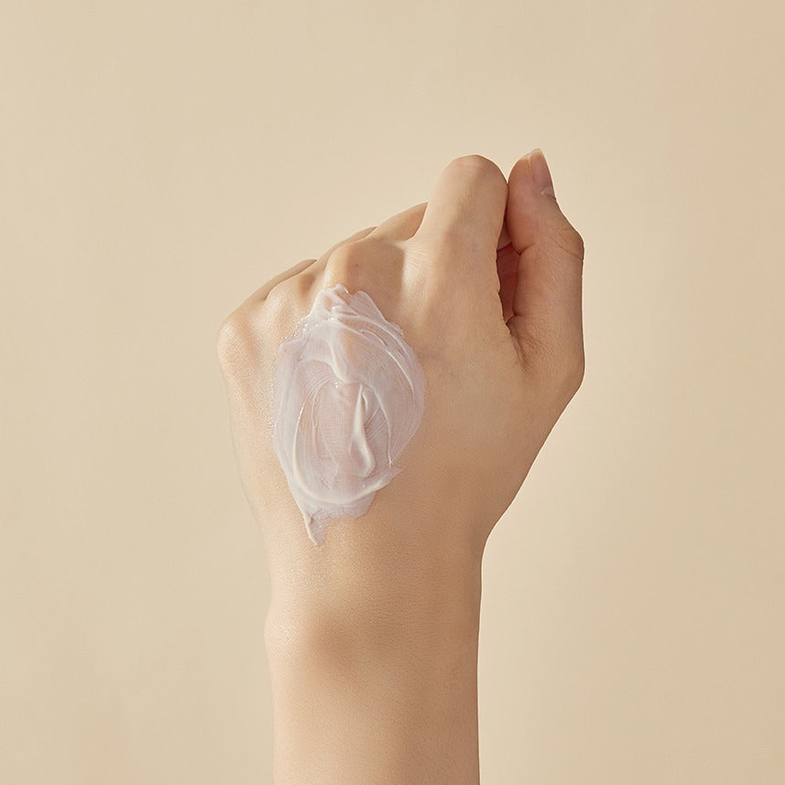 SOORYEHAN Hyobidam Fermented Sunscreen 60ml texture on hand, showcasing creamy consistency and smooth application on skin.