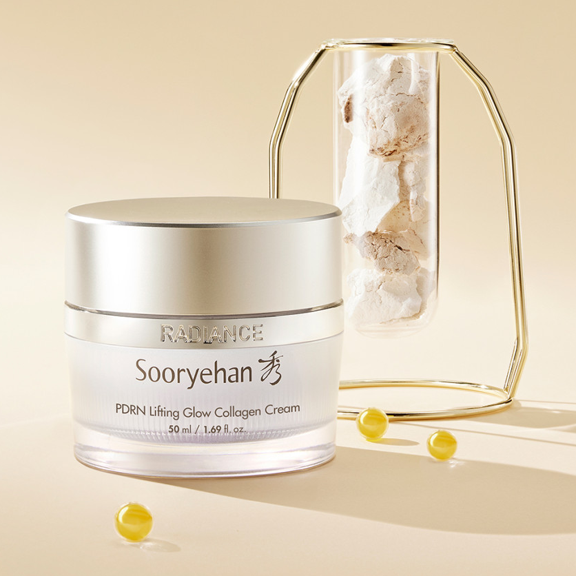 SOORYEHAN Radiance PDRN lasticity Cream 50ml jar displayed elegantly with capsules and a unique container in the background