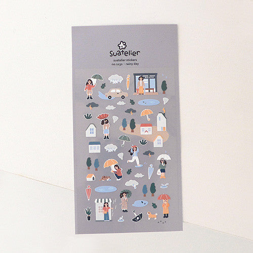 SUATELIER Rainy Day Stickers featuring playful rainy scenes, ideal for journaling and crafting projects, displayed on a gray background.