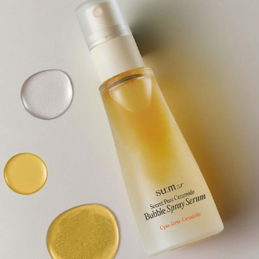 SU:M37 Secret Pore Ceramide Bubble Oil Essence Mist 60ml with product image and colorful droplets displayed.