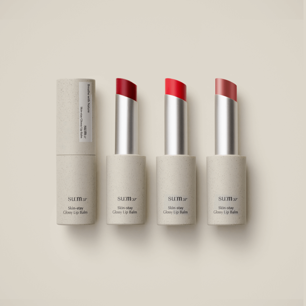 SU:M37 Skin-Stay Glossy Lip Balm featuring three shades of glossy finish lip balms with sleek packaging.
