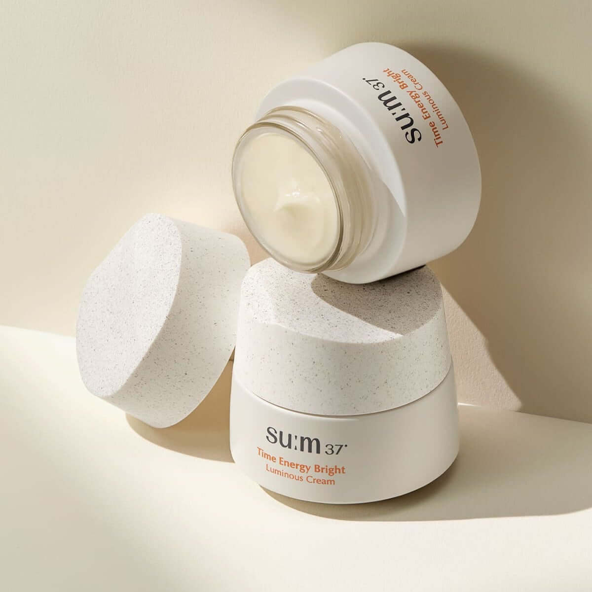 SU:M37 Time Energy Bright Luminous Cream 50ml open jar showing texture on cream lid.