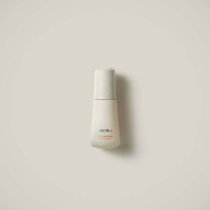 Image of SU:M37 Time Energy Bright Luminous Serum 50ml bottle on a neutral background.