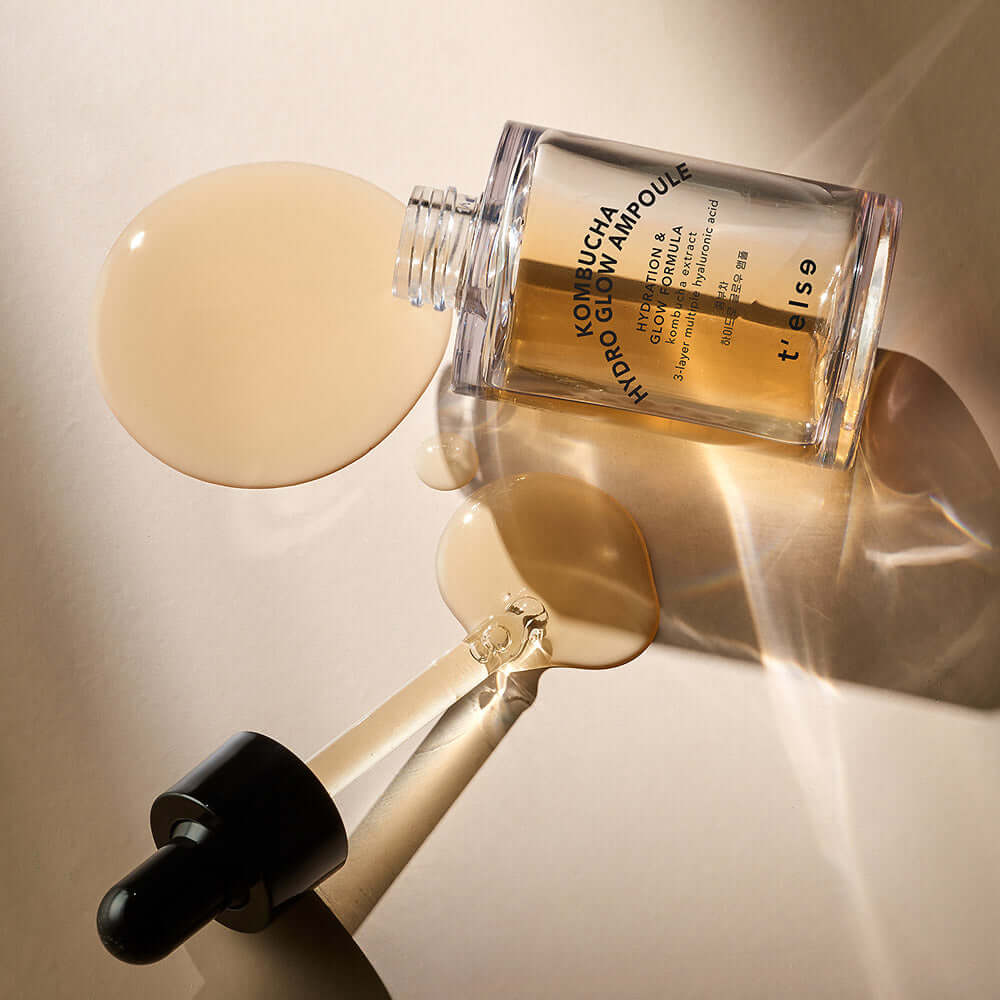 T'ELSE Kombucha Hydro Glow Ampoule 30ml bottle with dropper on a table.