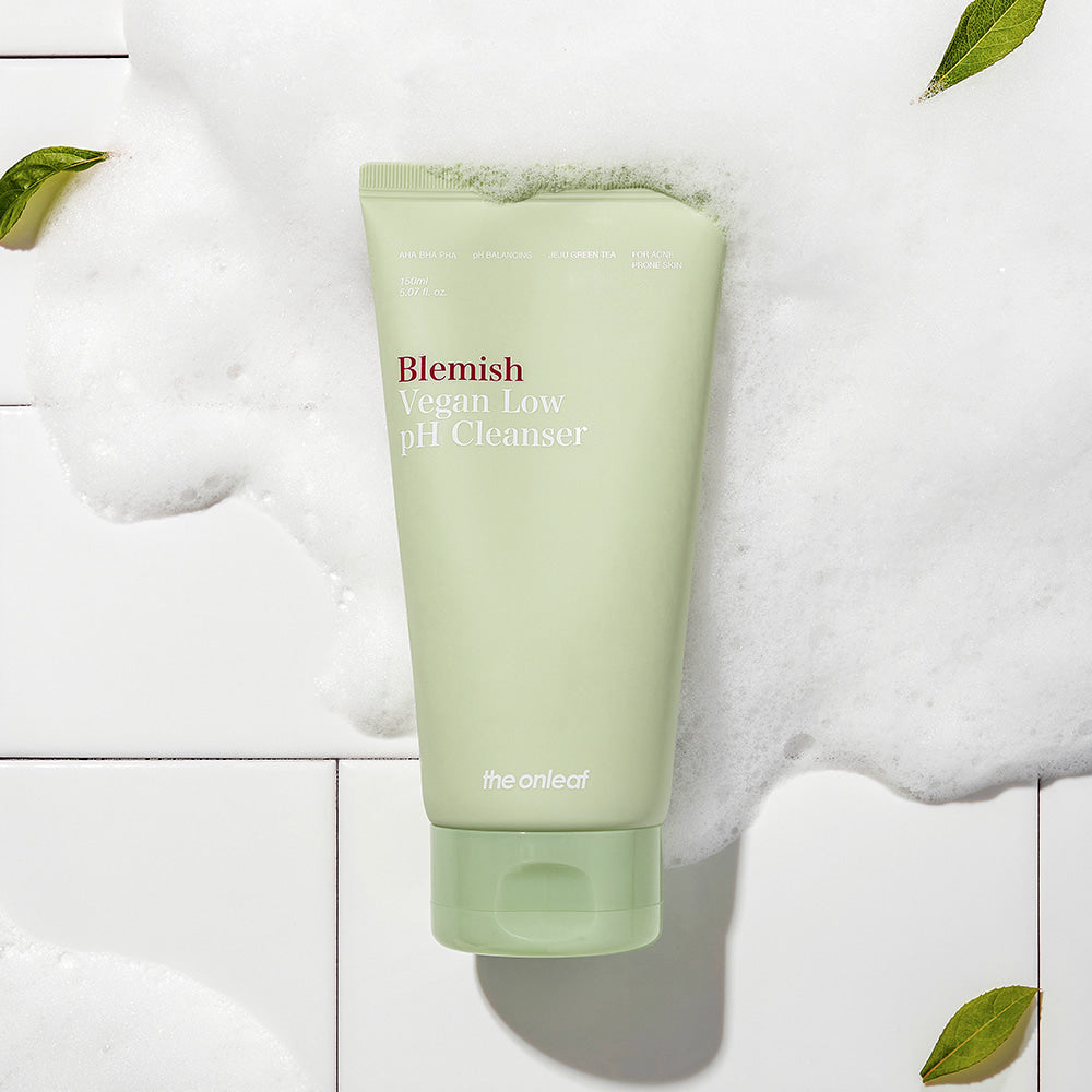 THE ONLEAF Blemish Vegan Low pH Cleanser 150ml in a foam background for skincare