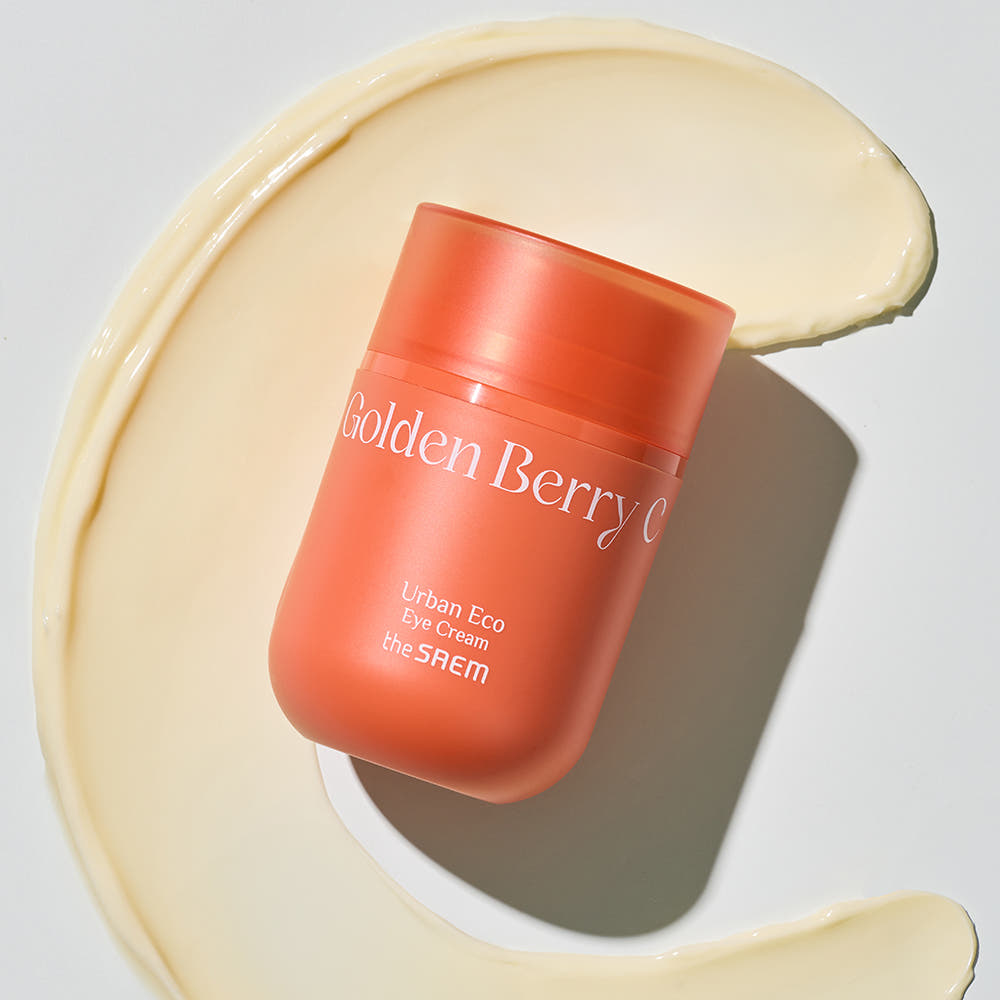 THE SAEM Urban Eco Golden Berry C Eye Cream 30ml jar on creamy background