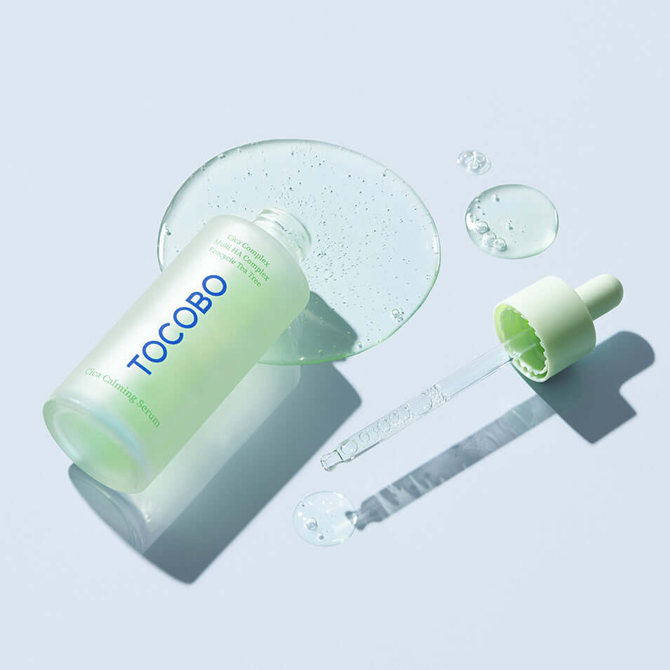 TOCOBO Cica Calming Serum bottle and dropper with serum droplets on a light background