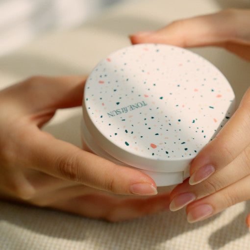 TONE FIT SUN Vegan Tone Up Sun Cushion SPF50+ PA++++ in hand, showcasing its packaging and design.