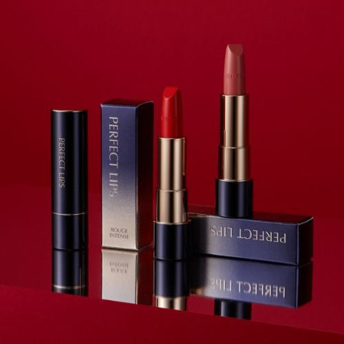 TONY MOLY Perfect Lips Rouge Intense lipsticks displayed with packaging on a red background.