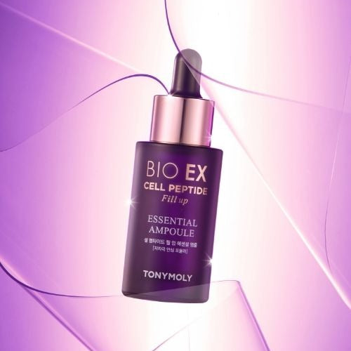TONYMOLY Bio EX Cell Peptide Fill-Up Essential Ampoule 30ml against a pink abstract background