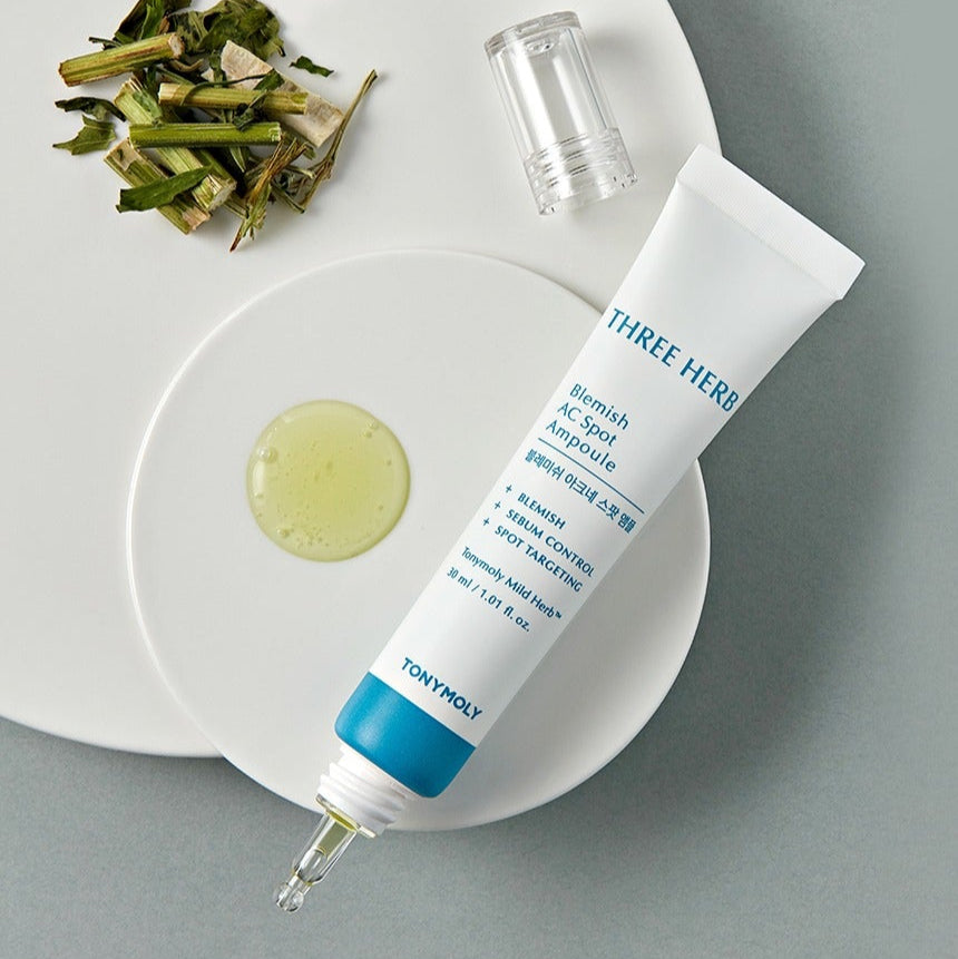 TONYMOLY Blemish Acne Spot Ampoule 30ml on a plate with herbs, skincare serum for blemish control