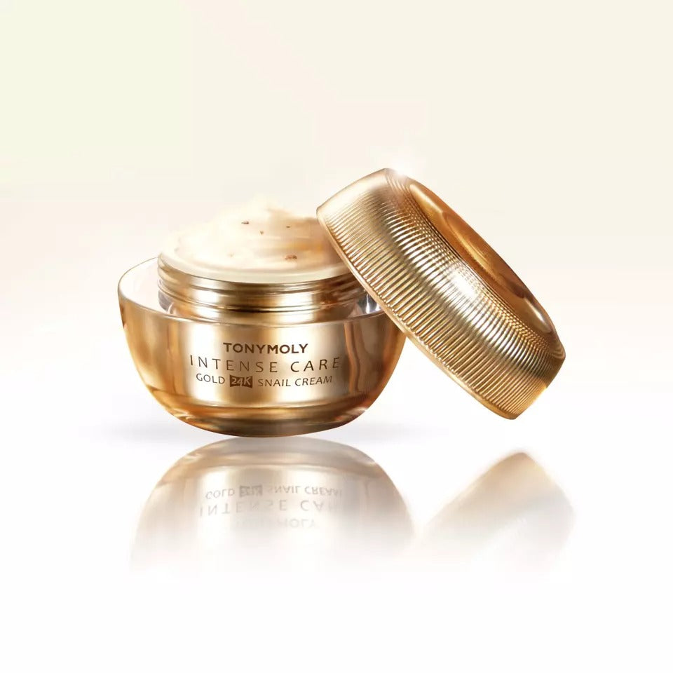 Open jar of TONYMOLY Intense Care Gold24K Snail Cream 45ml with gold lid, showcasing luxurious skincare product.