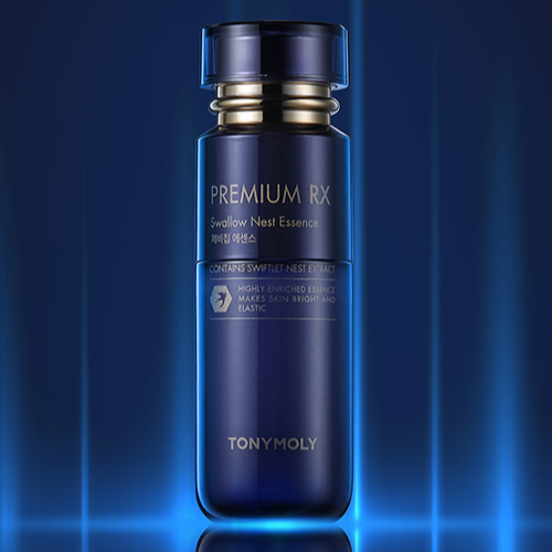 Blue bottle of TONYMOLY Premium RX Swallow's Nest Essence 55ml on a glowing background