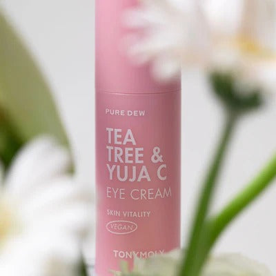 TONYMOLY Pure Dew Tea Tree & Yuzu Seed Vitality Eye Cream 30ml in a floral setting