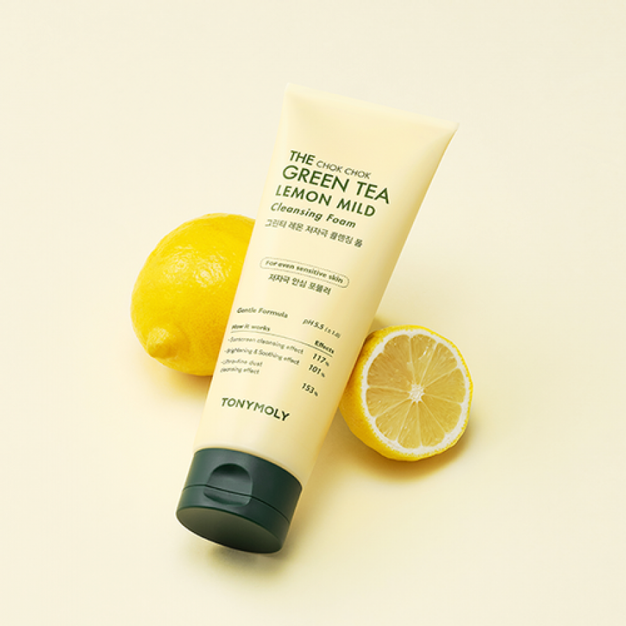 TONYMOLY The Chok Chok Green Tea Lemon Mild Cleansing Foam 150ml with fresh lemons in the background