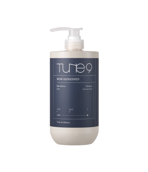 Bottle of TONYMOLY Tune 9 Wow Refreshing Shampoo 1000g with label and pump dispenser.