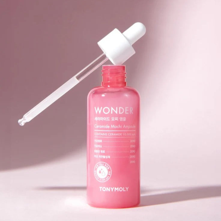 TONYMOLY Wonder Ceramide Mochi Ampoule 100ml in pink bottle with dropper on pink background