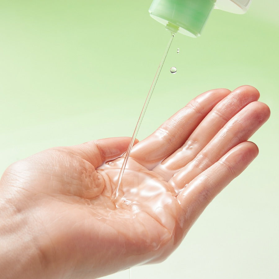 Pouring TORRIDEN Balanceful Peeling Toner 250ml into hand