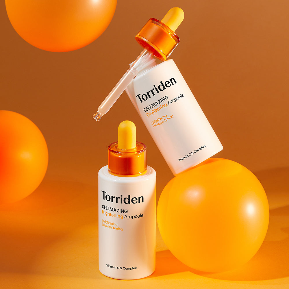 TORRIDEN Cellmazing Vitamin C5 Complex Brightening Ampoule 30ml bottles displayed with orange background and spheres